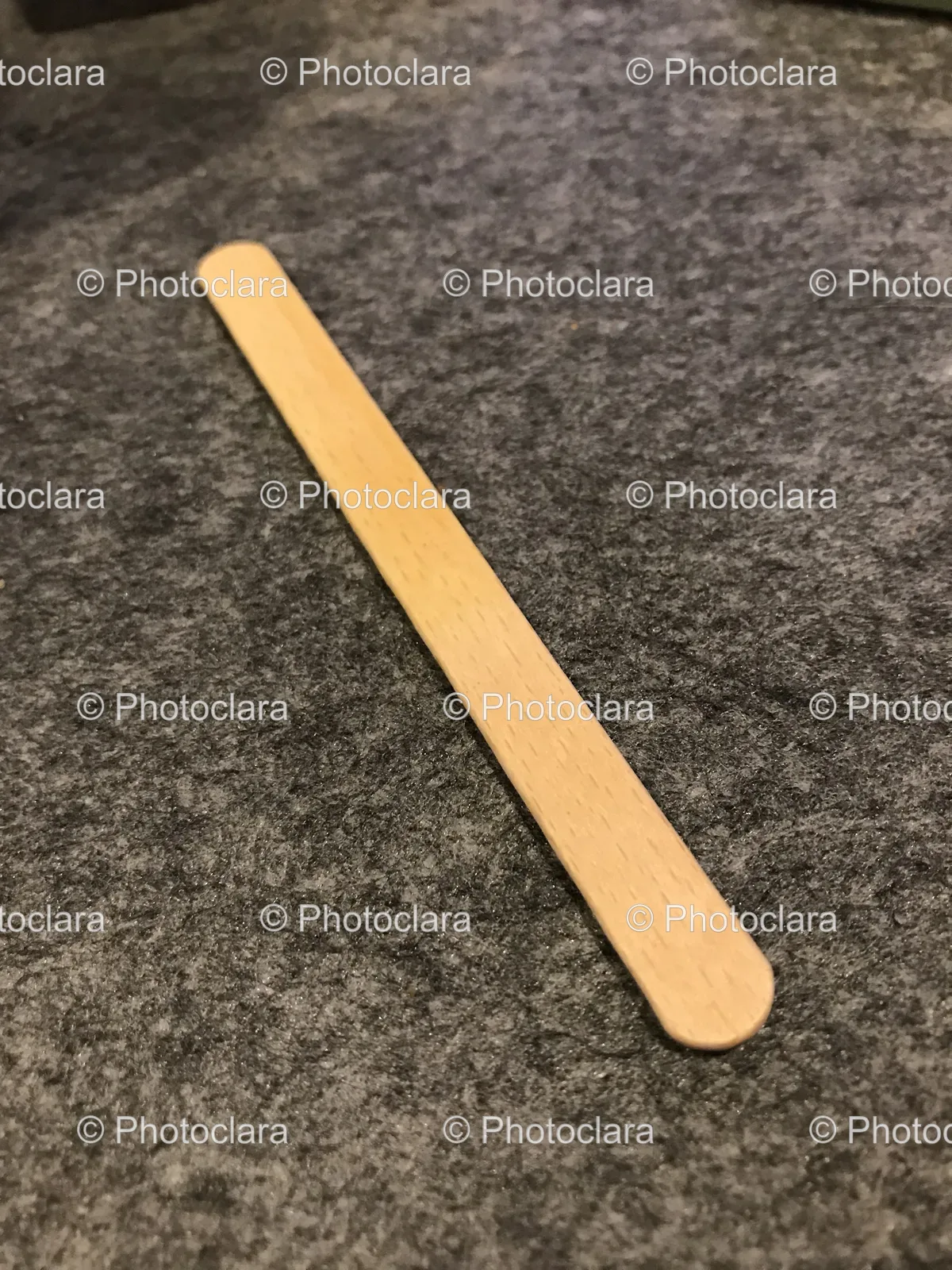 Wooden-Stick-on-Grey-Surface.jpg