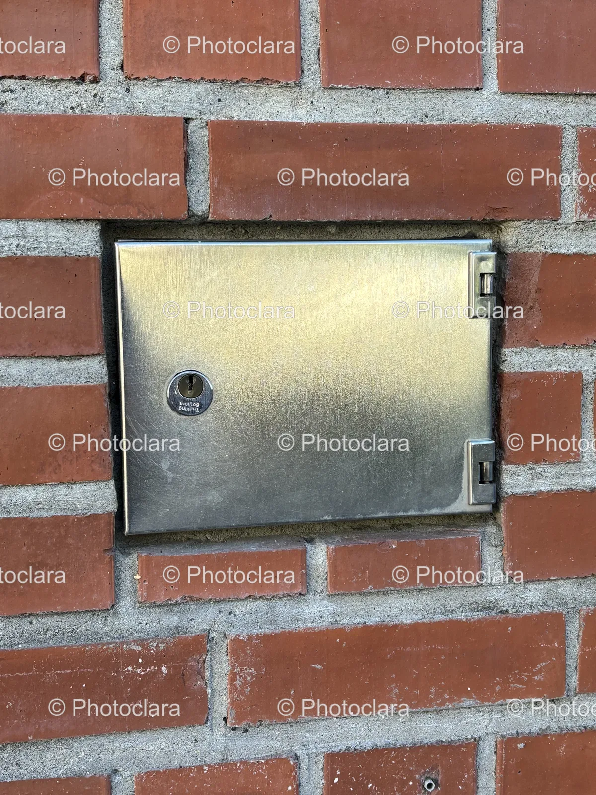 metal-box-on-brick-wall.jpg