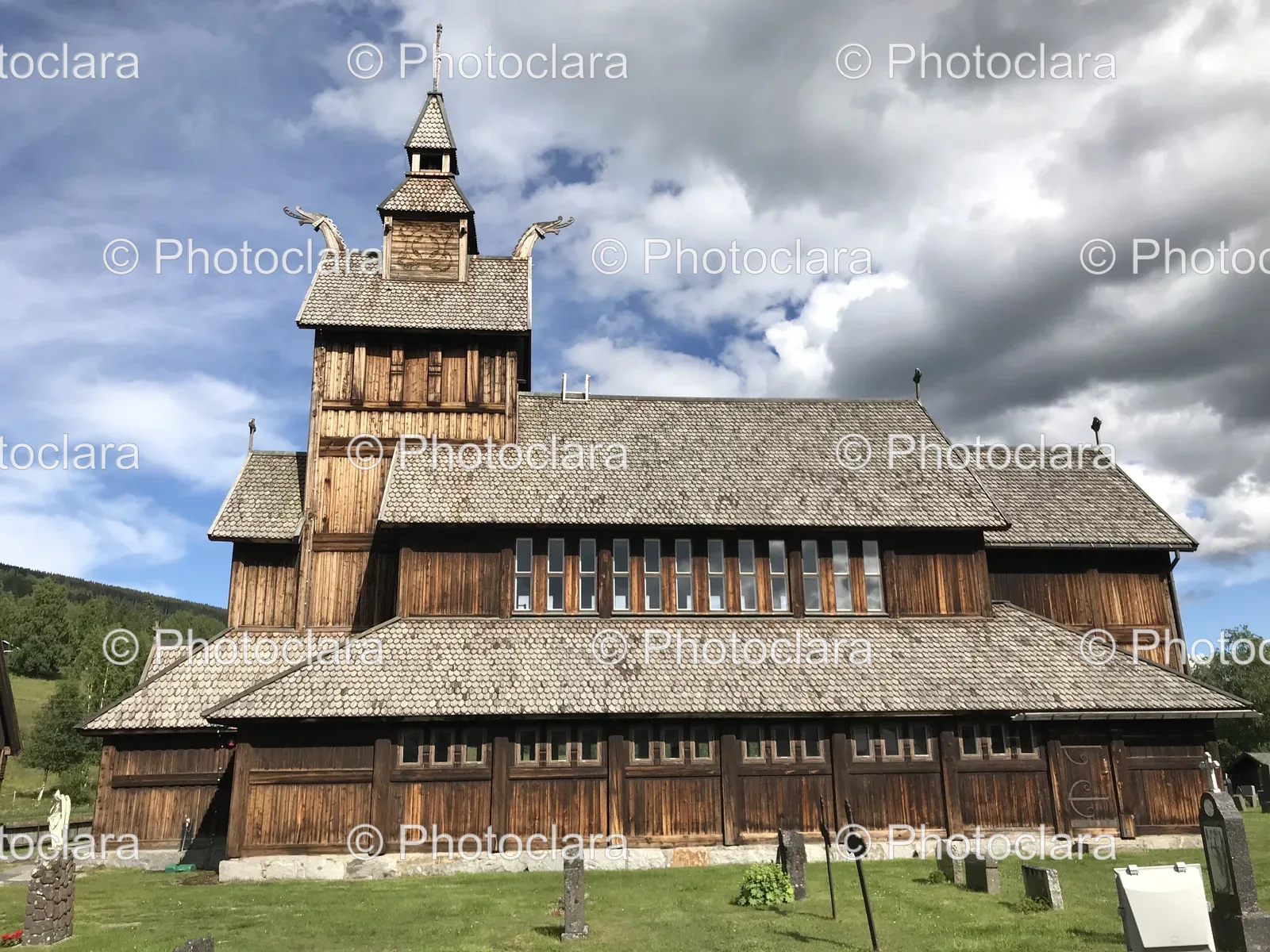 Large-Wooden-Building-with-Steeple-and-Grass.jpg