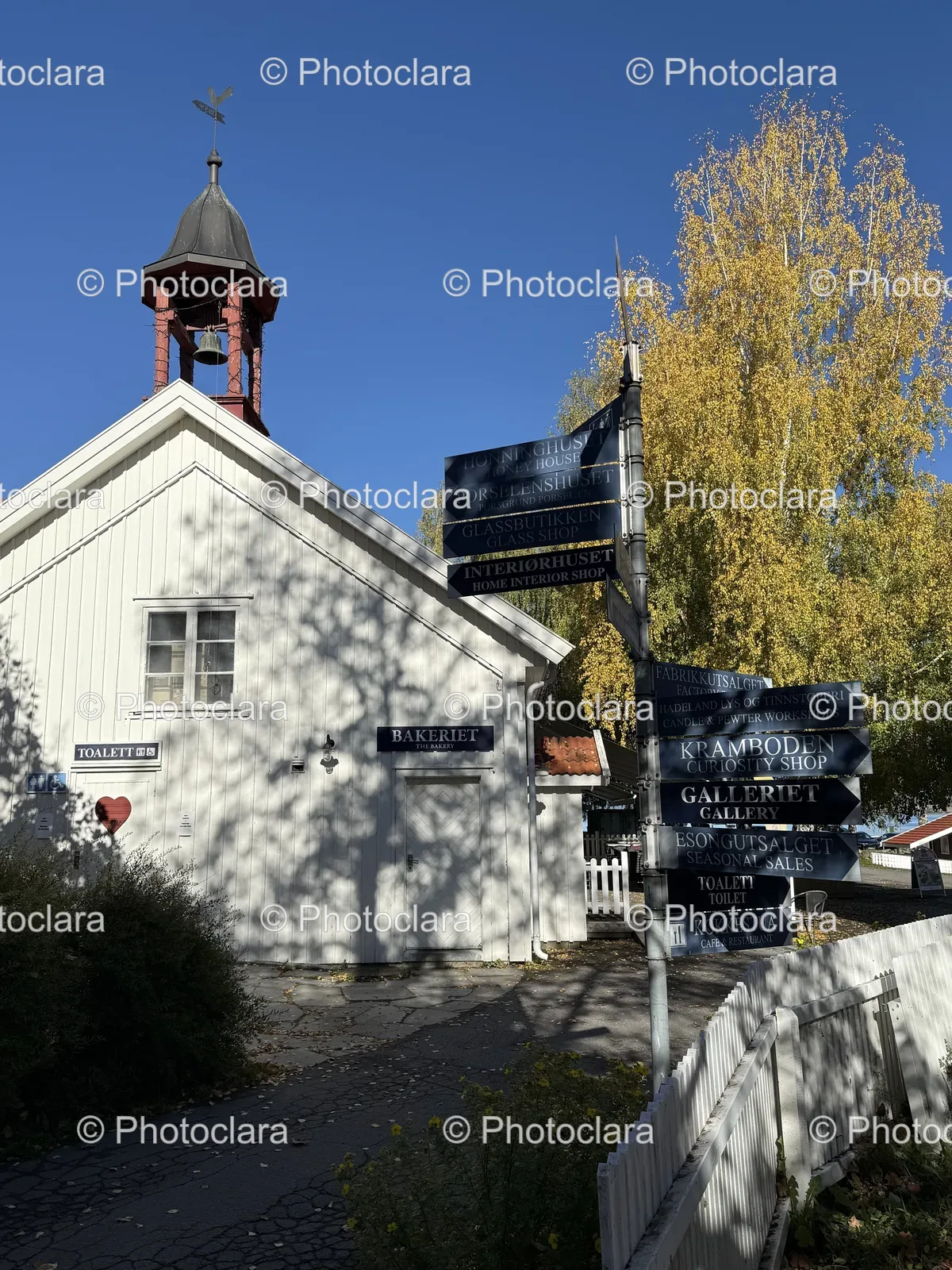 White-Building-Bell-Tower-Street-Signs.jpg