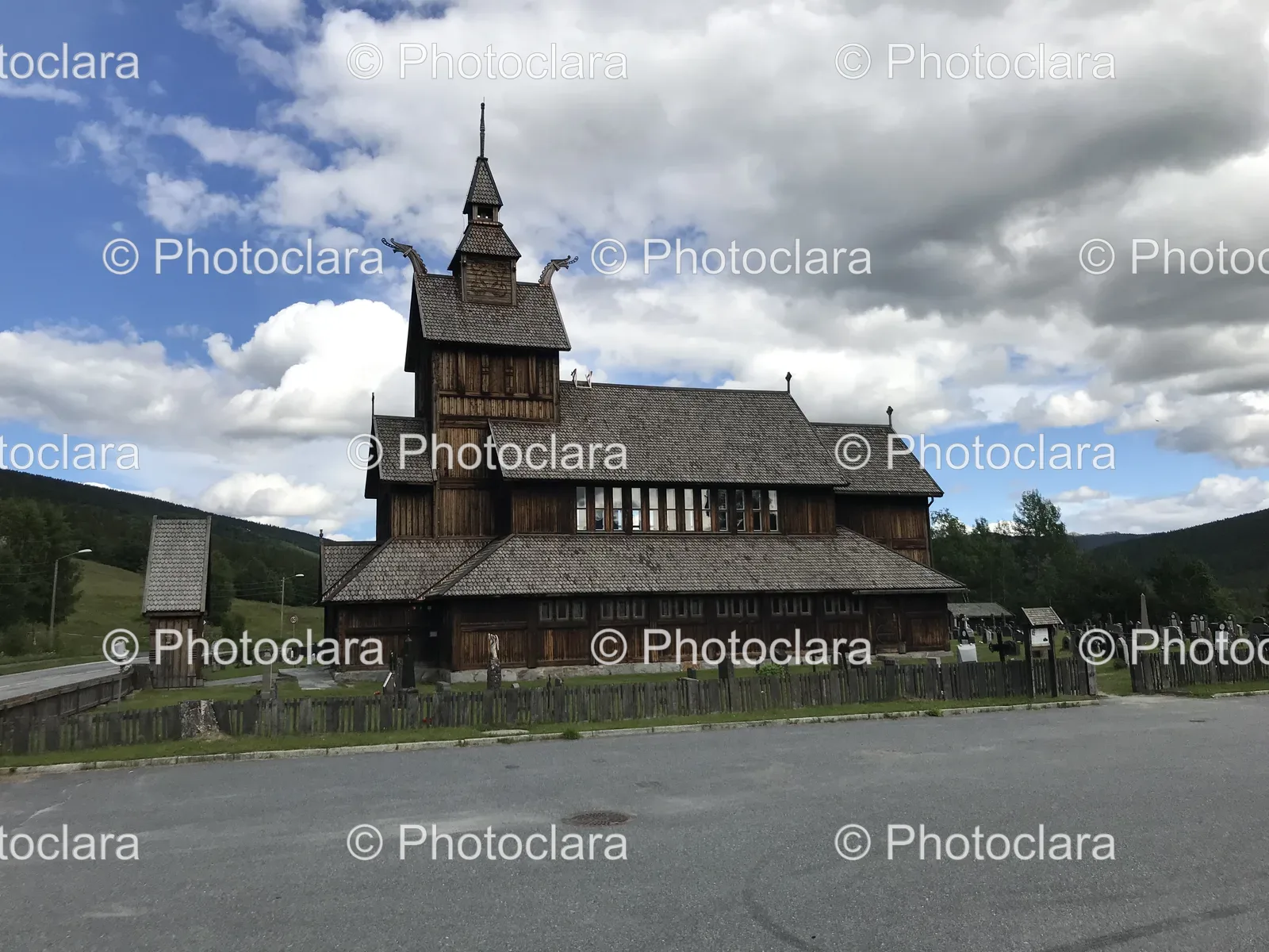 wooden-church-and-fence-by-the-road.jpg