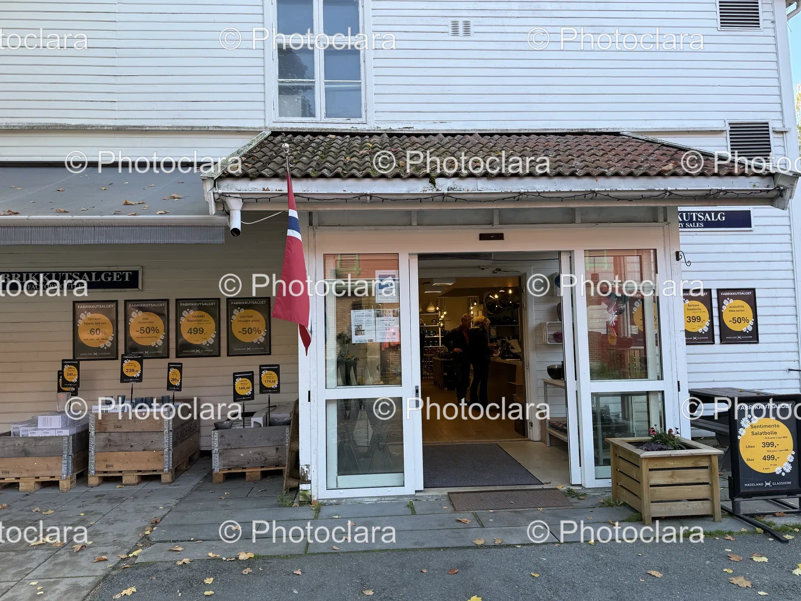 storefront-with-flags-and-sale-signs.jpg