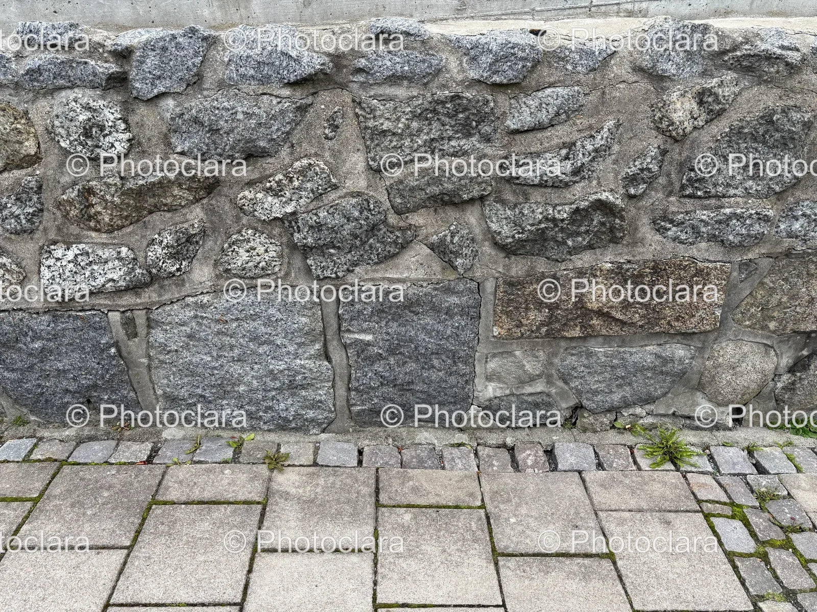 stone-walkway-against-stone-wall.jpg