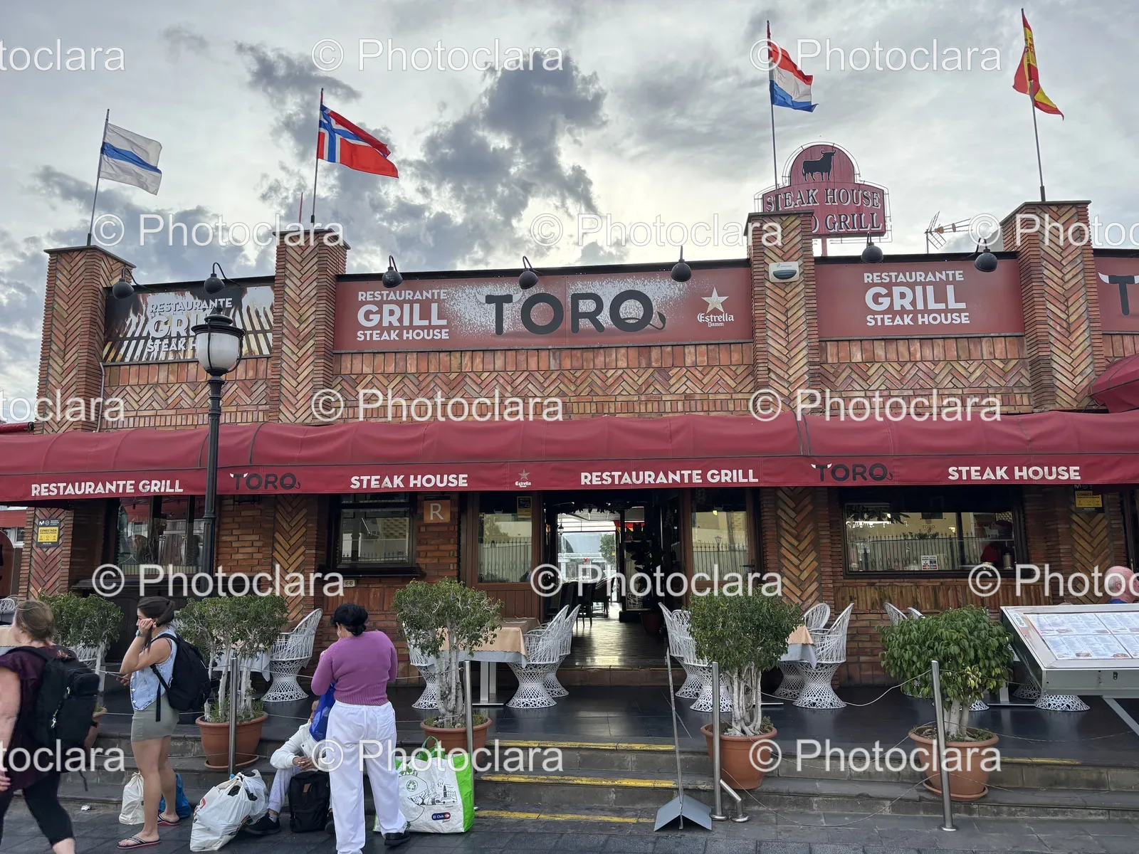 Charming-Steakhouse-Red-Awning-Flags.jpg