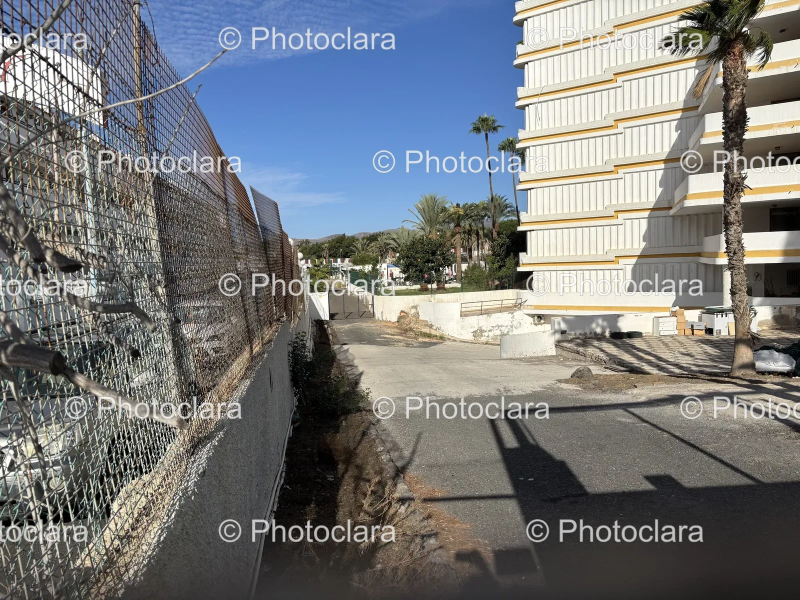 Building-with-Adjacent-Fence.jpg