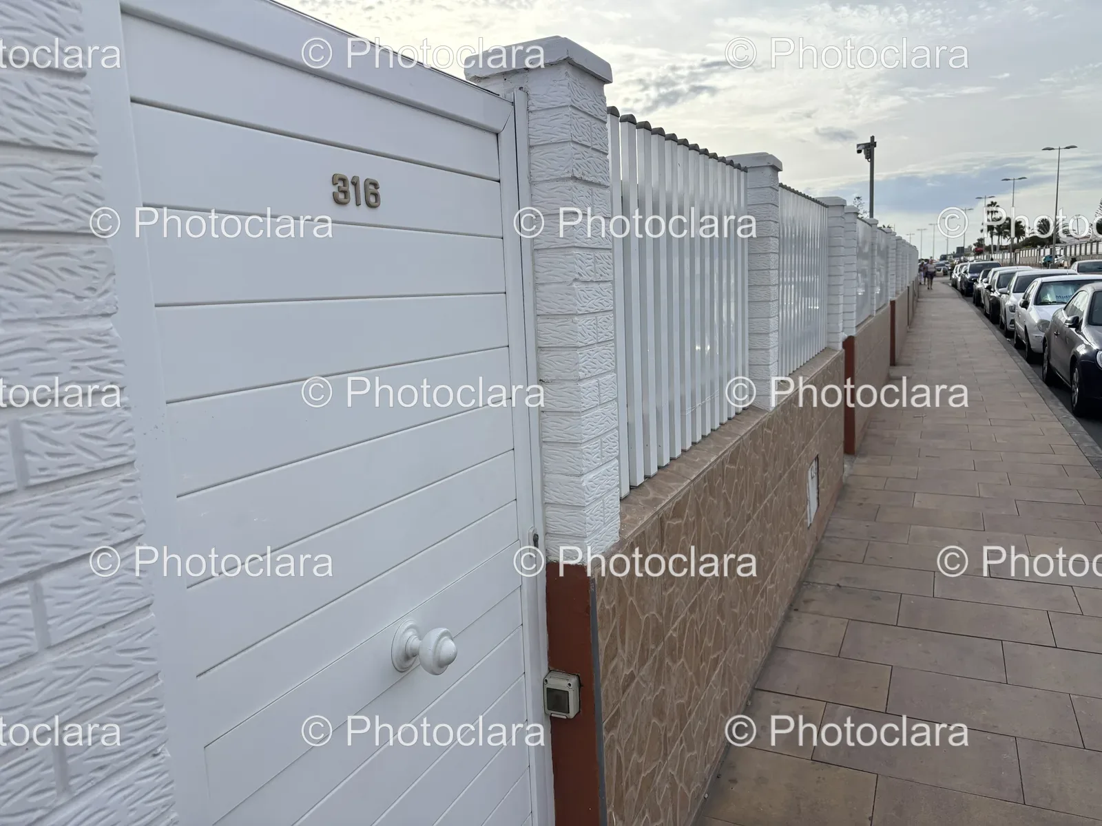 white-fence-with-number.jpg