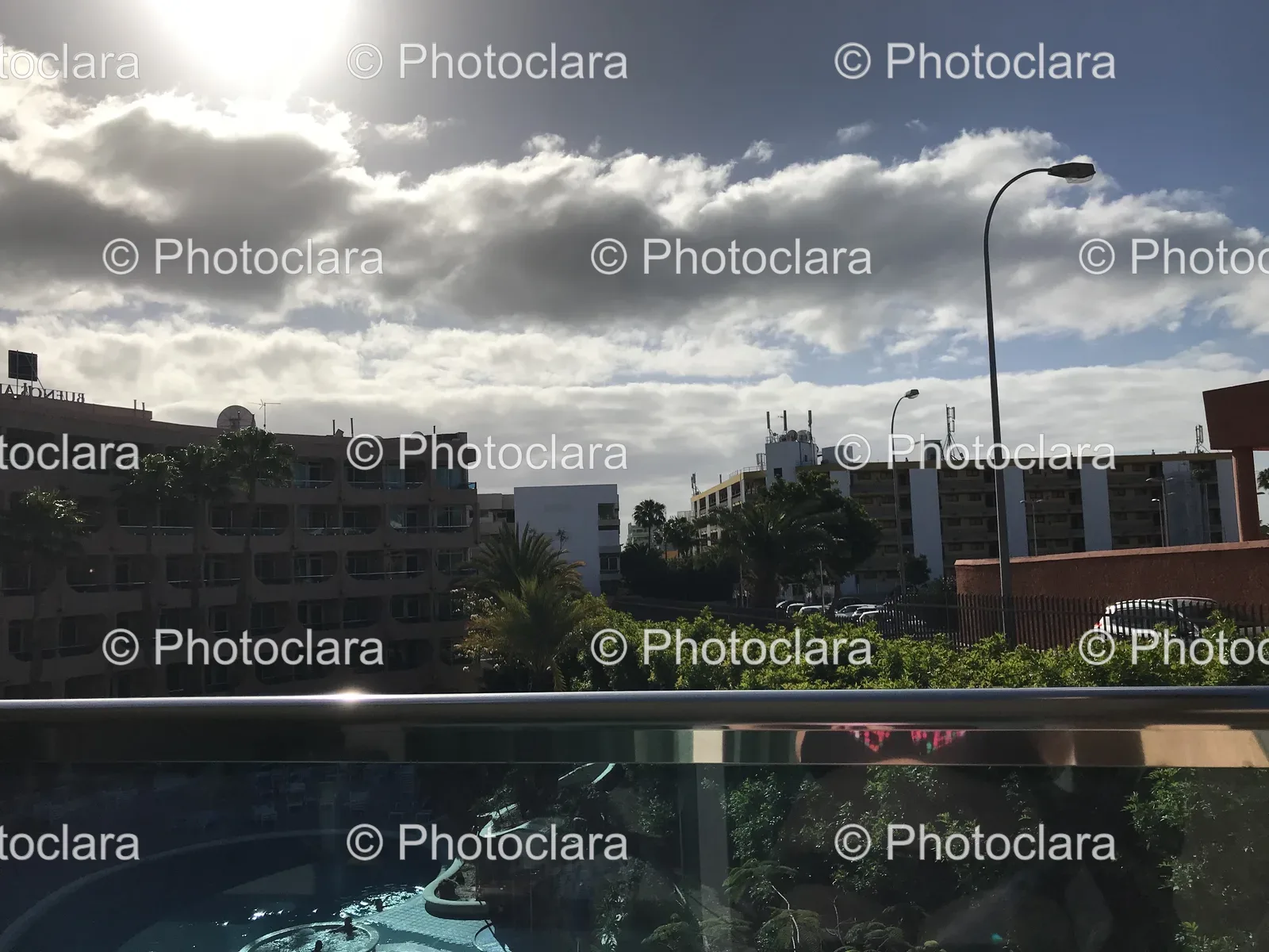 Balcony-View-of-Modern-Pool-and-Buildings.jpg