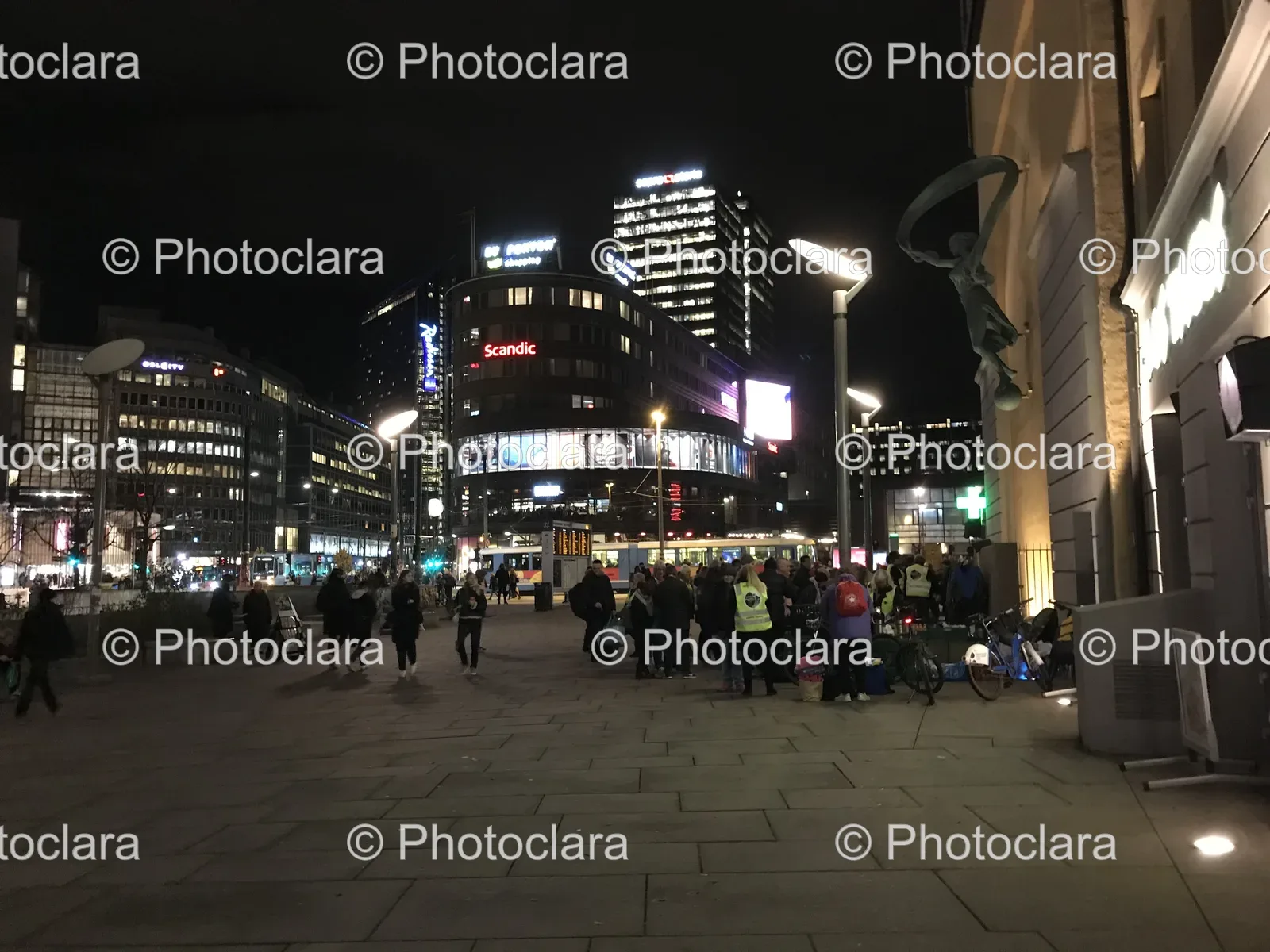 group-of-people-walking-on-a-nighttime-urban-sidewalk.jpg