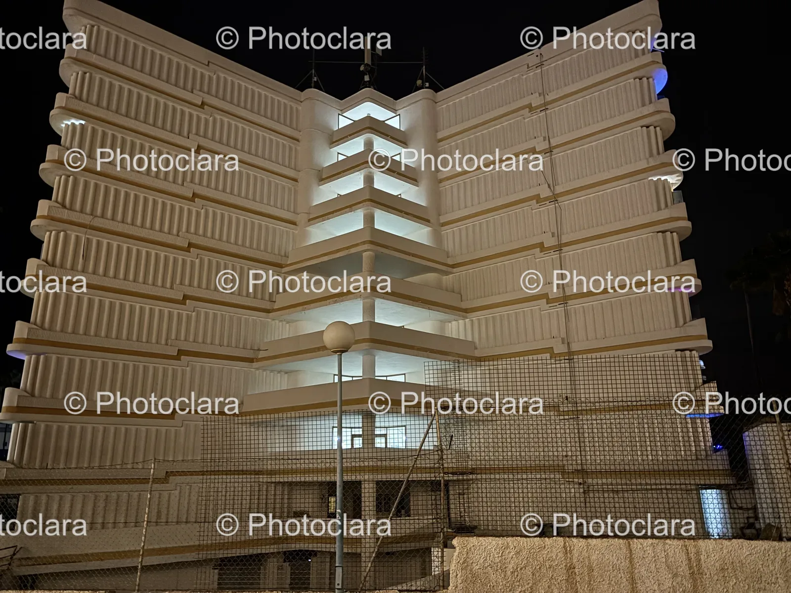 illuminated-building-night-fence-urban.jpg