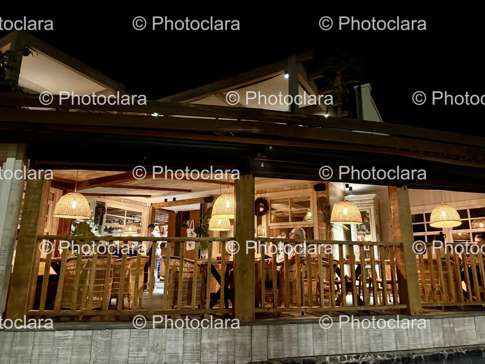 Building-with-Porch-and-Deck-at-Night.jpg