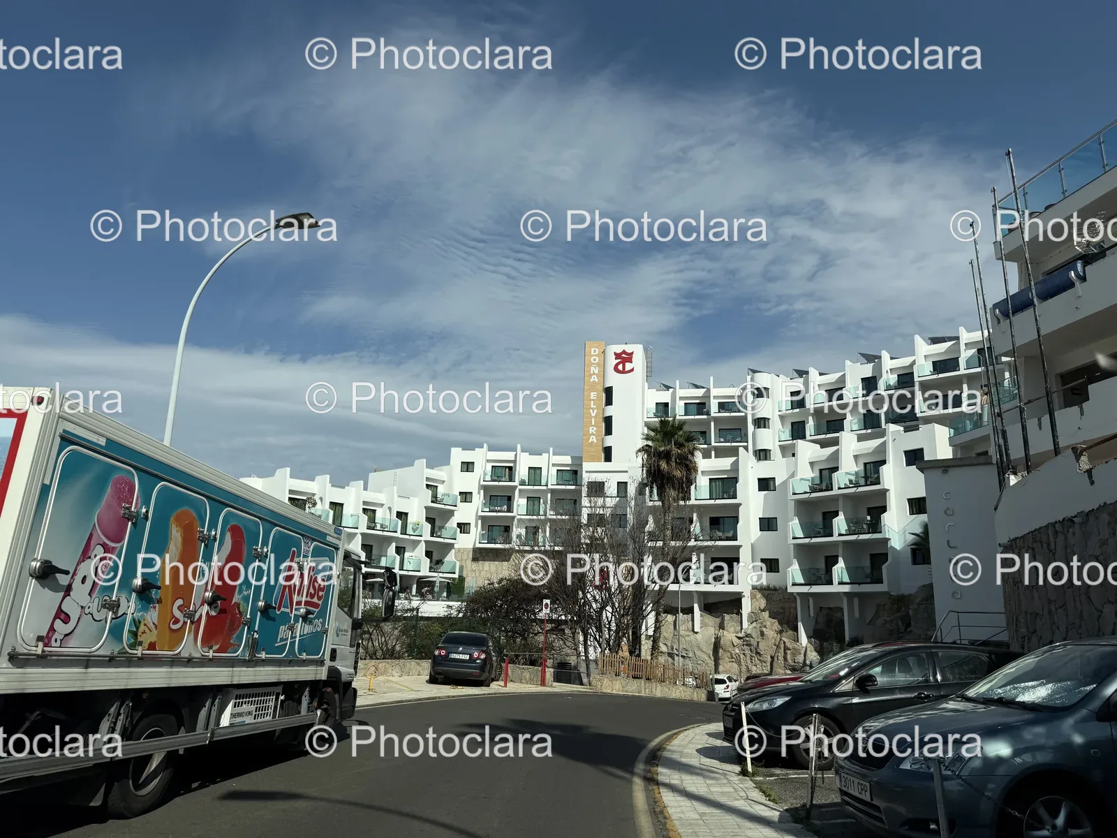 Modern-Residential-Building-With-Balconies-And-Truck.jpg