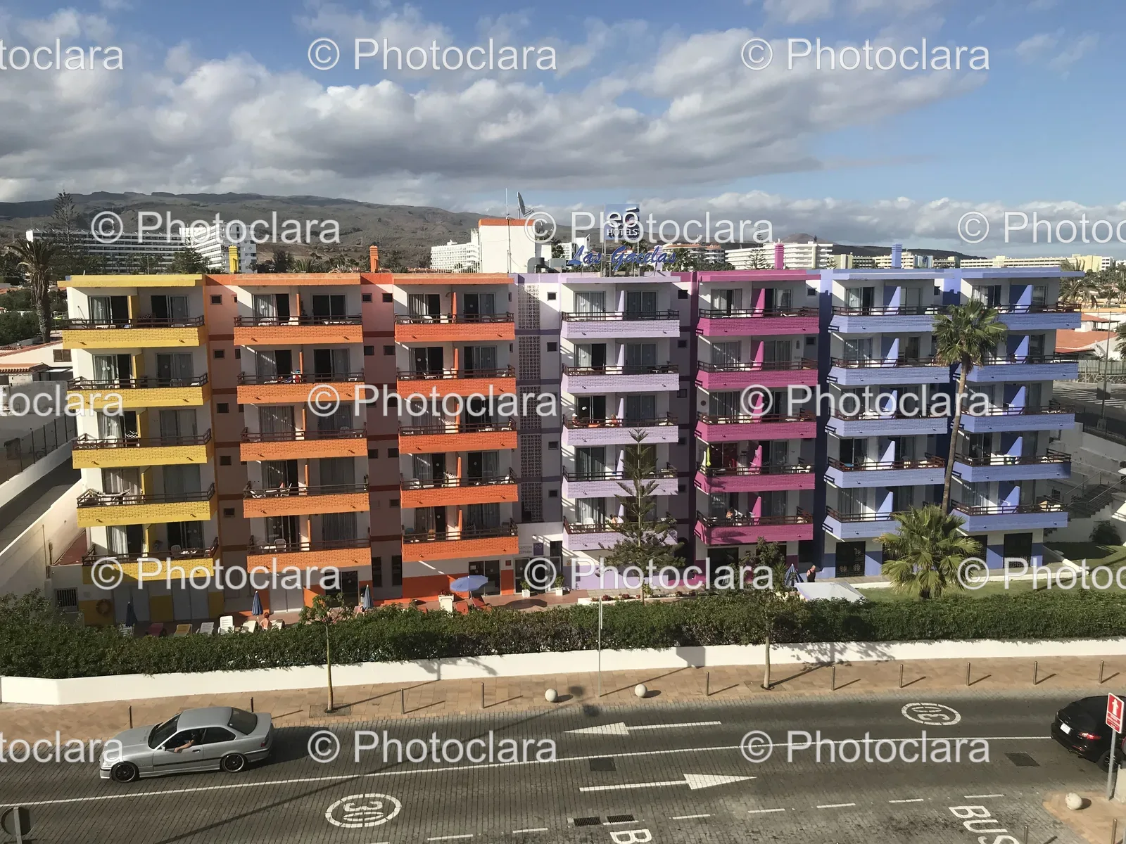 Colorful-Residential-Building-with-Road-and-Trees.jpg