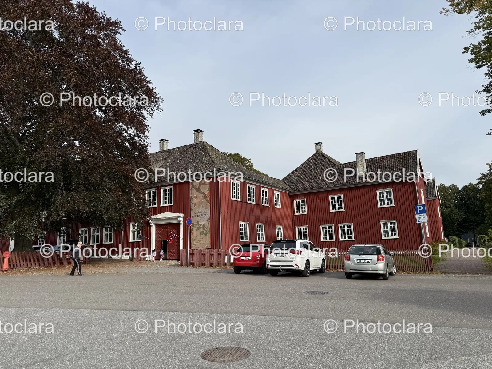 Red-Residential-Building-with-Parked-Cars.jpg