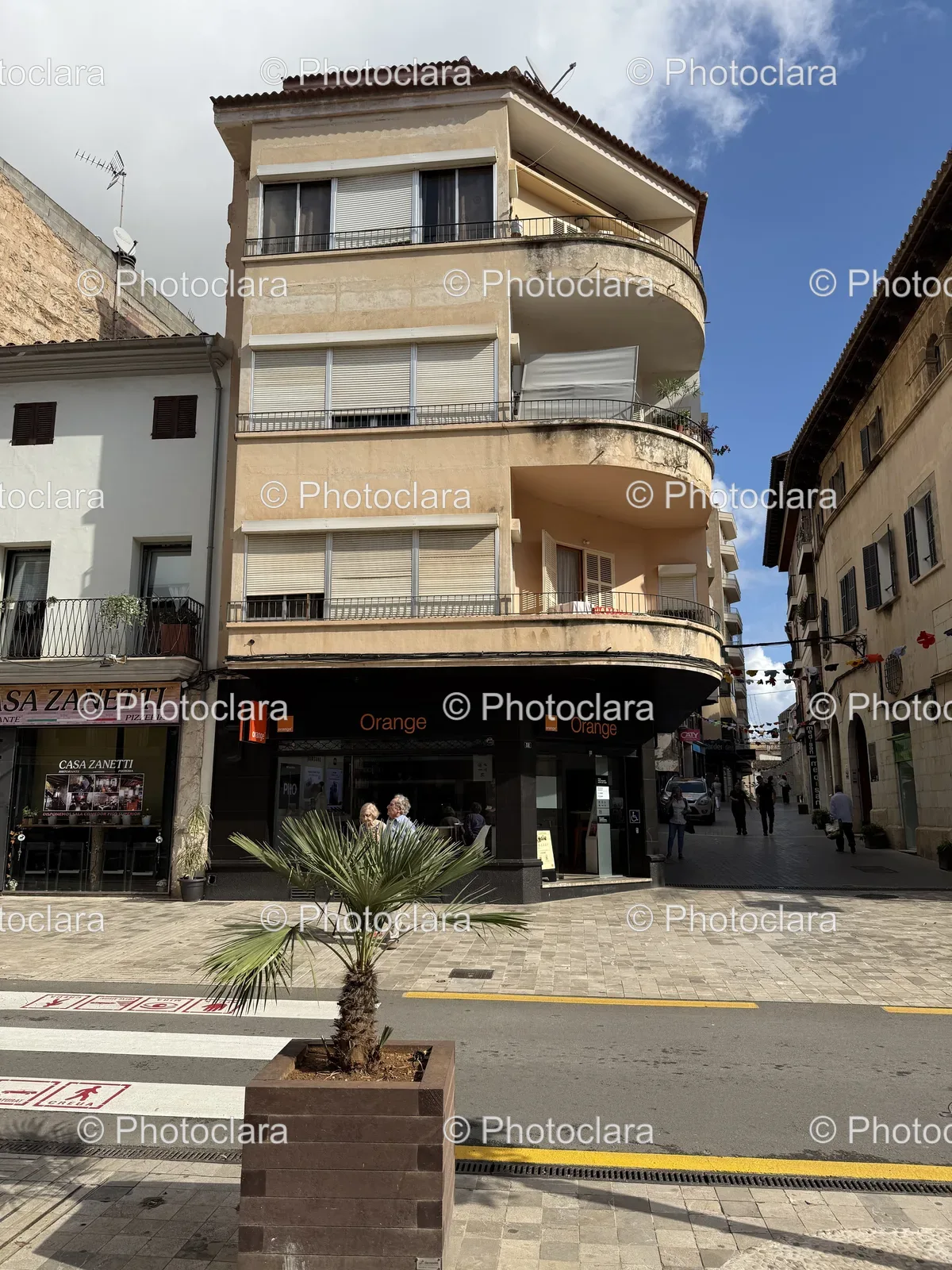urban-residential-building-with-palm-tree.jpg