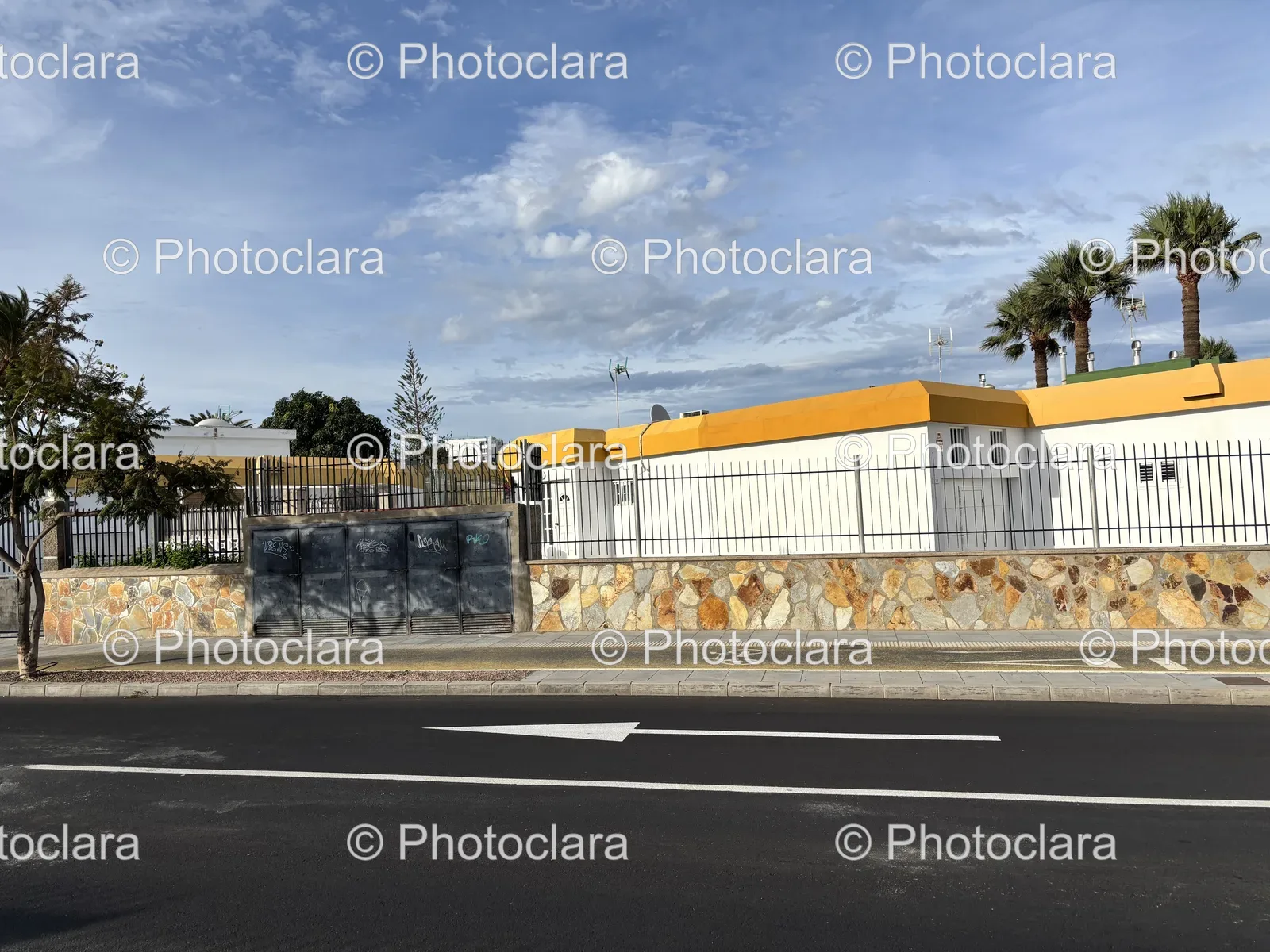 Yellow-and-White-Building-by-the-Road.jpg