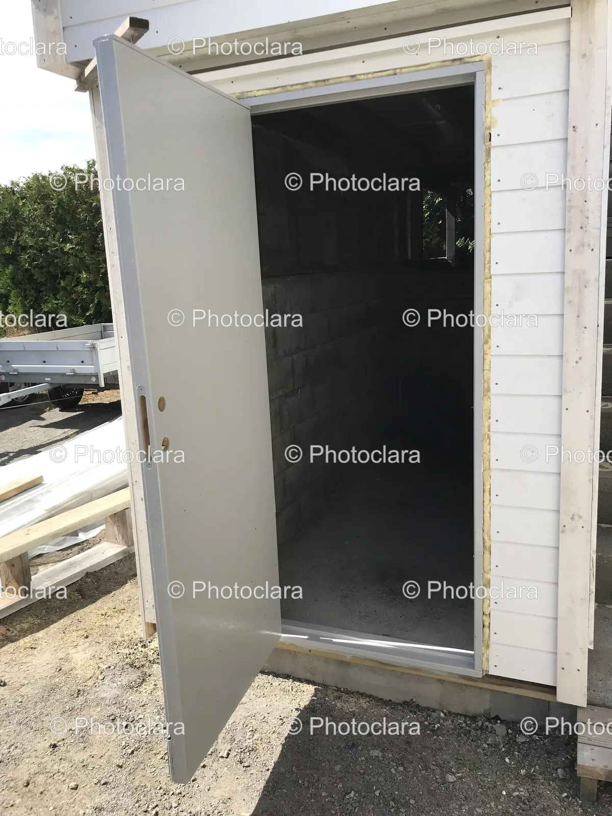 White-Shed-with-Open-Door.jpg