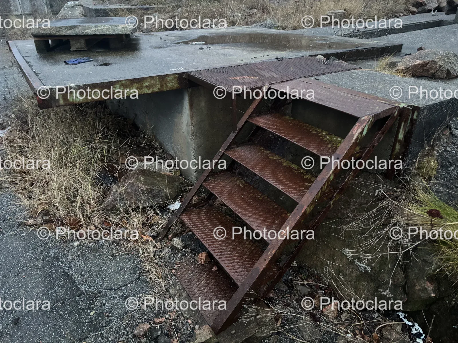 Abandoned-Metal-Stairs-on-Concrete.jpg