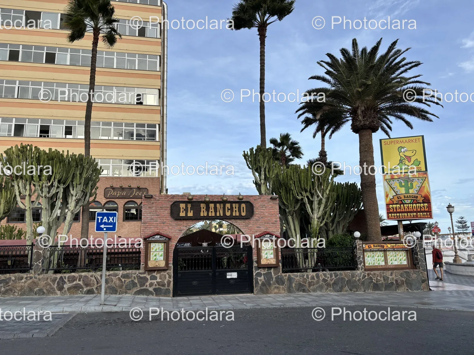 Supermarket-and-Restaurant-under-Palm-Trees.jpg