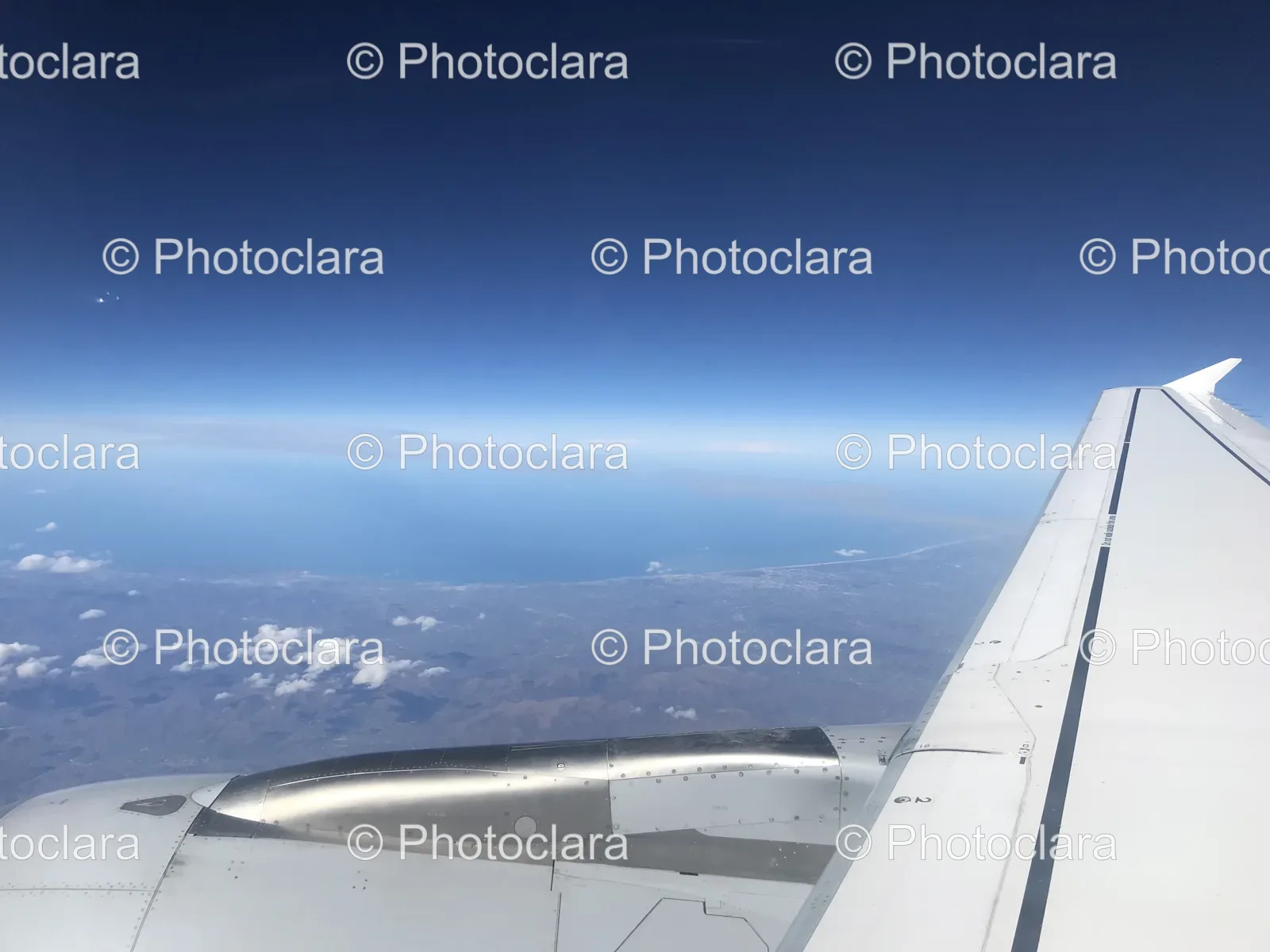 airplane-wing-and-sky.jpg