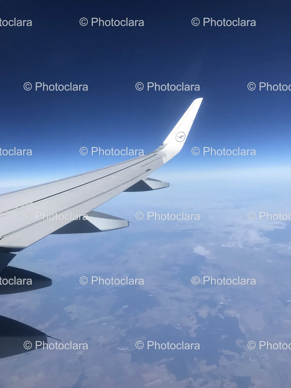 airplane-wing-sky-view.jpg