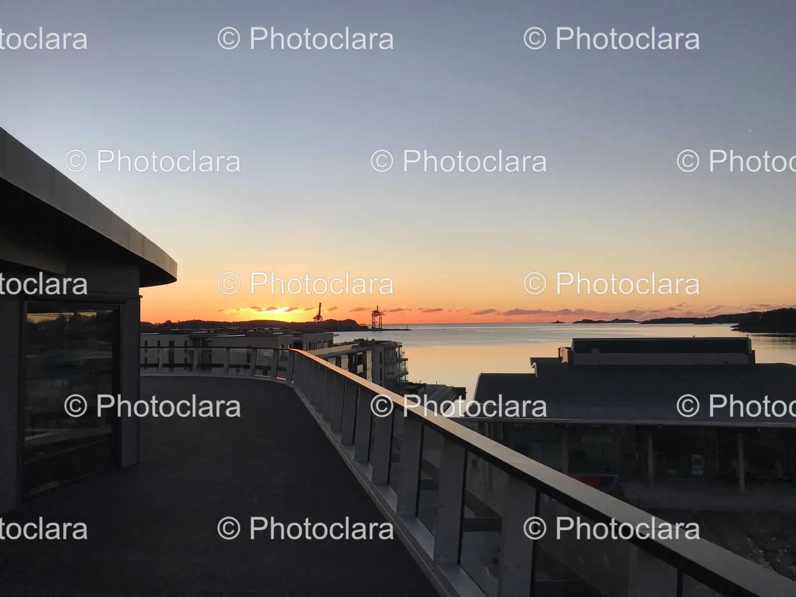 Balcony-Overlooking-a-Tranquil-Lake-at-Sunrise.jpg