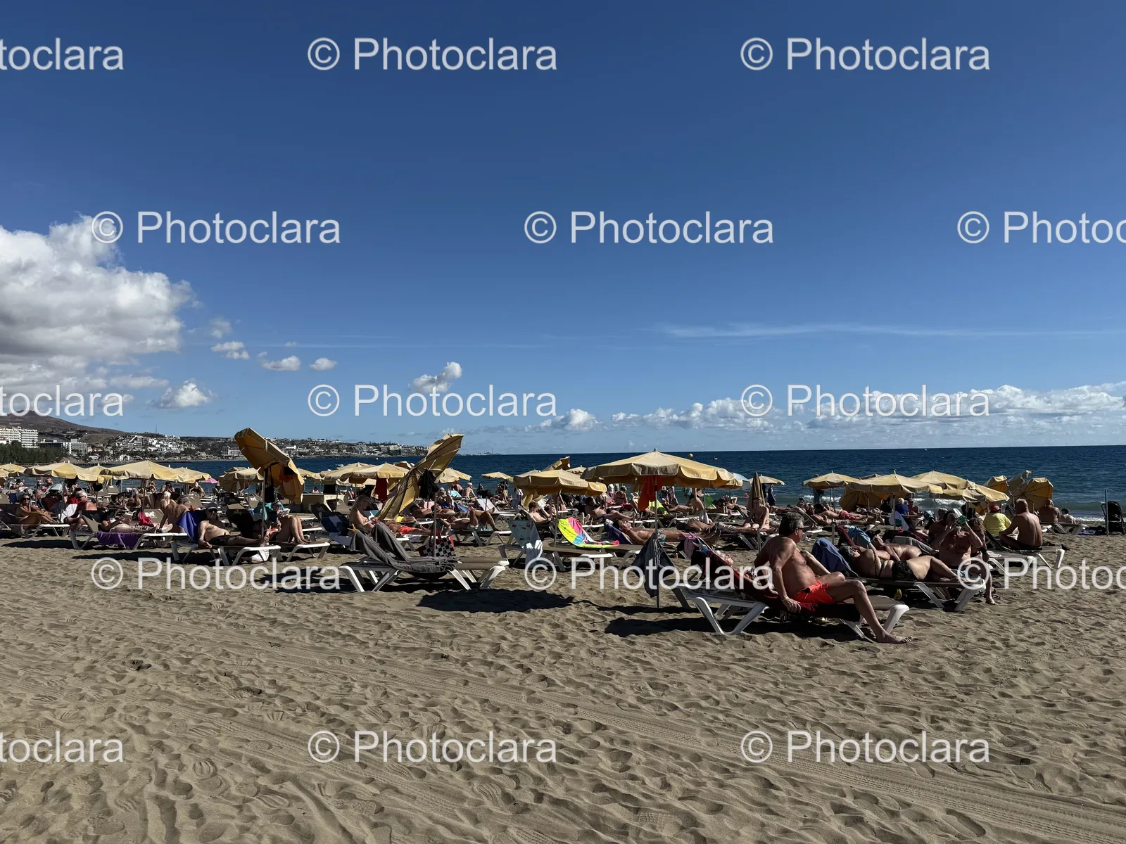 Group-of-People-Enjoying-Day-at-the-Beach.jpg