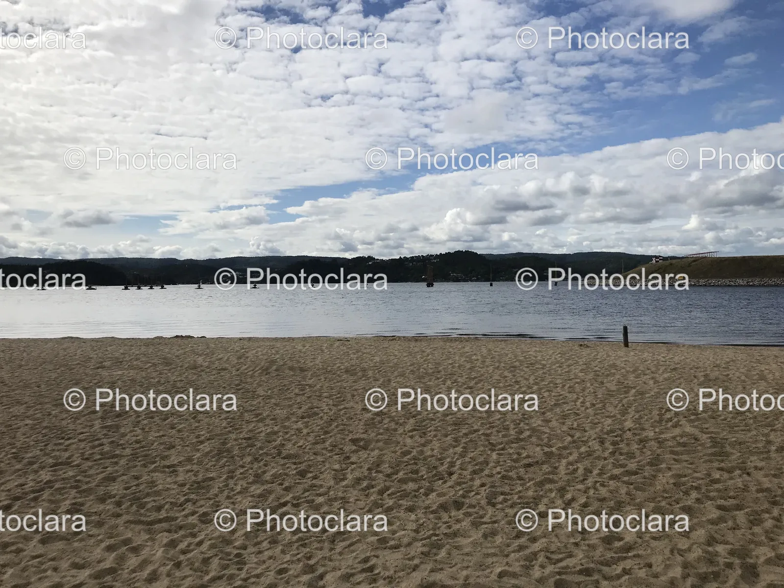Serene-Beach-with-Cloudy-Sky.jpg