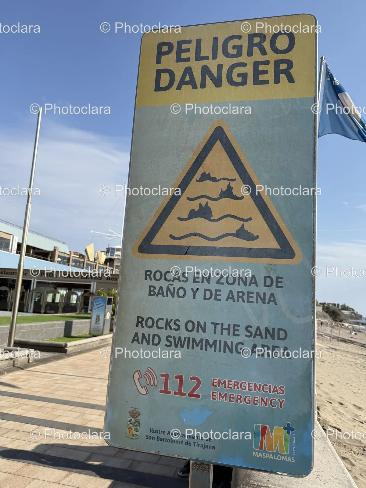 danger-sign-on-sandy-beach.jpg