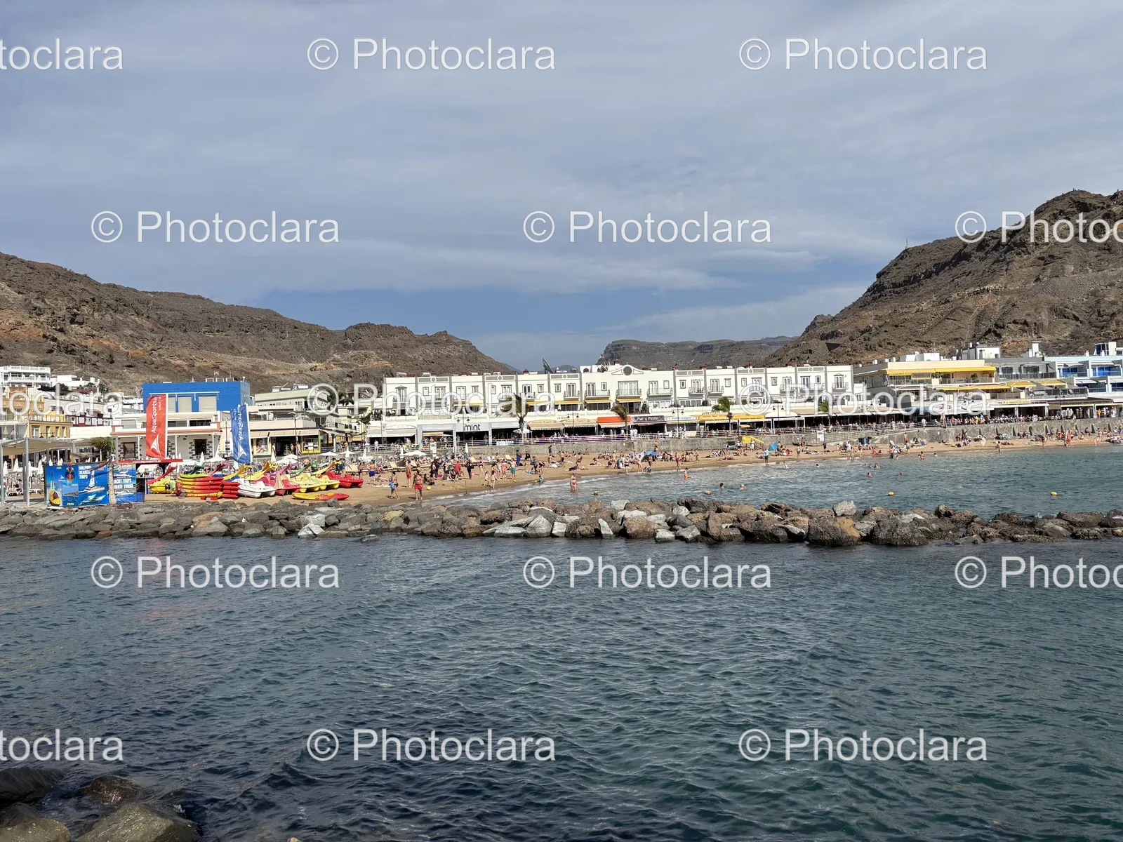 serene-beachfront-with-urban-backdrop.jpg