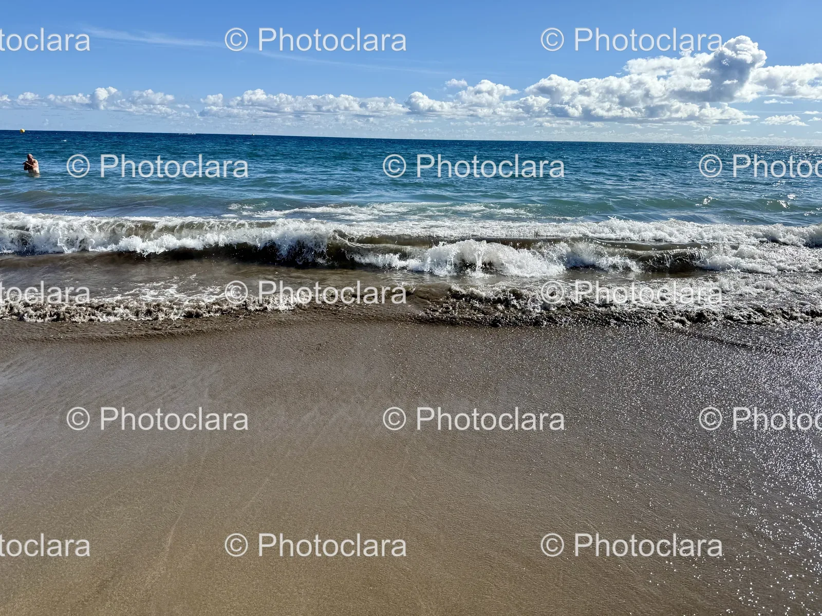 Waves-Crashing-on-a-Sandy-Shore.jpg