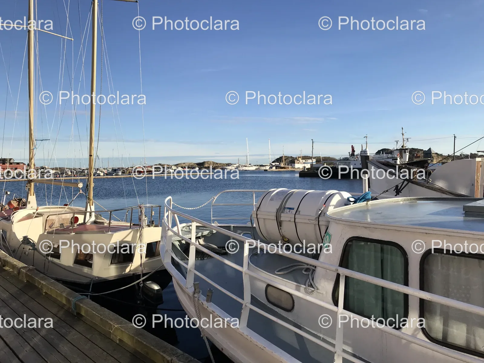 Boats-Docked-by-a-Serene-Waterfront.jpg
