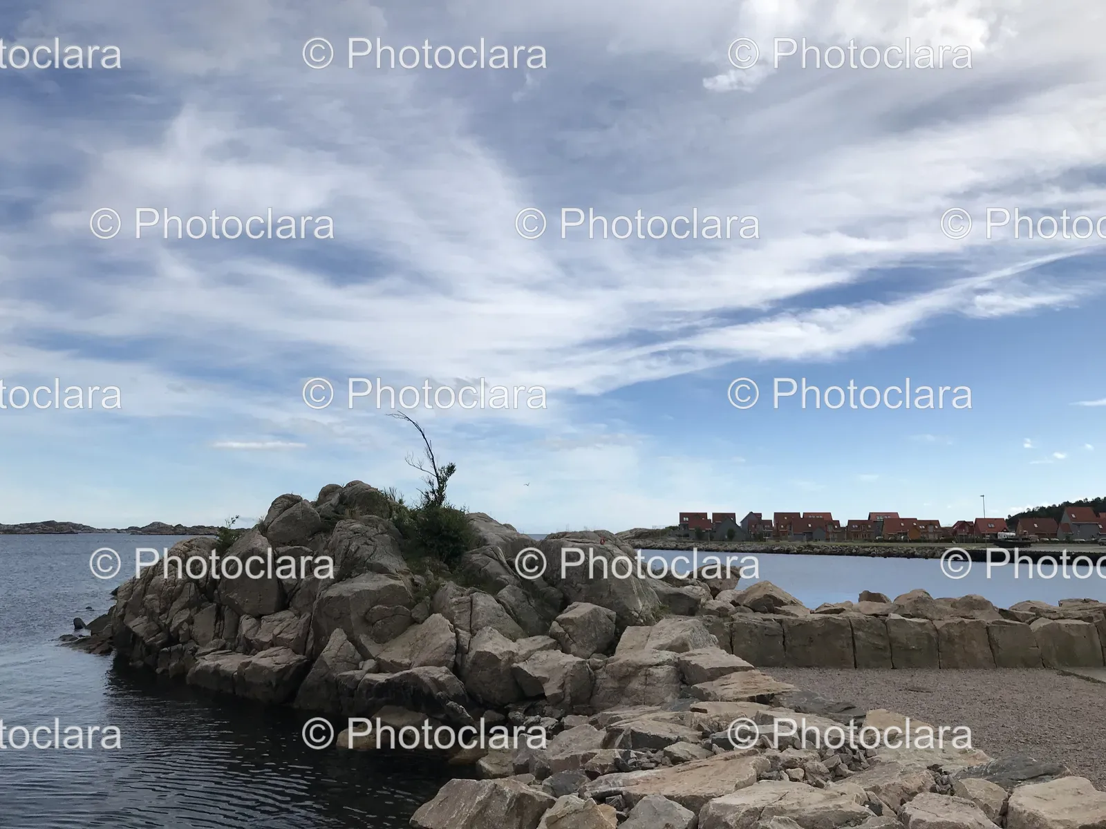 Rocky-Island-with-Coastal-Buildings.jpg