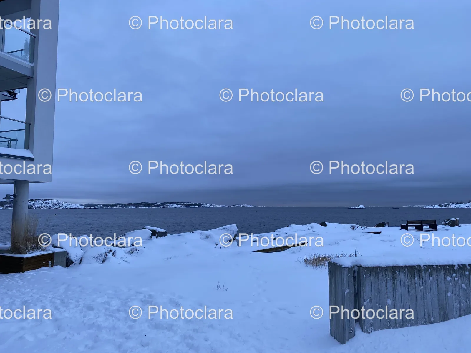 Snowy-Beach-with-Rocks-and-Water.jpg