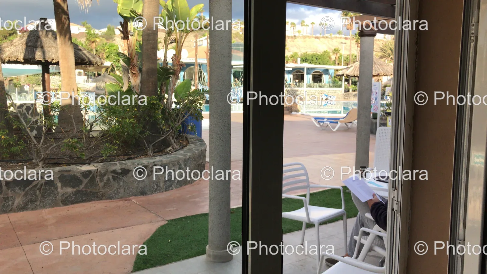 Person-Enjoying-Outdoor-Seating-Scenic-Spot.jpg