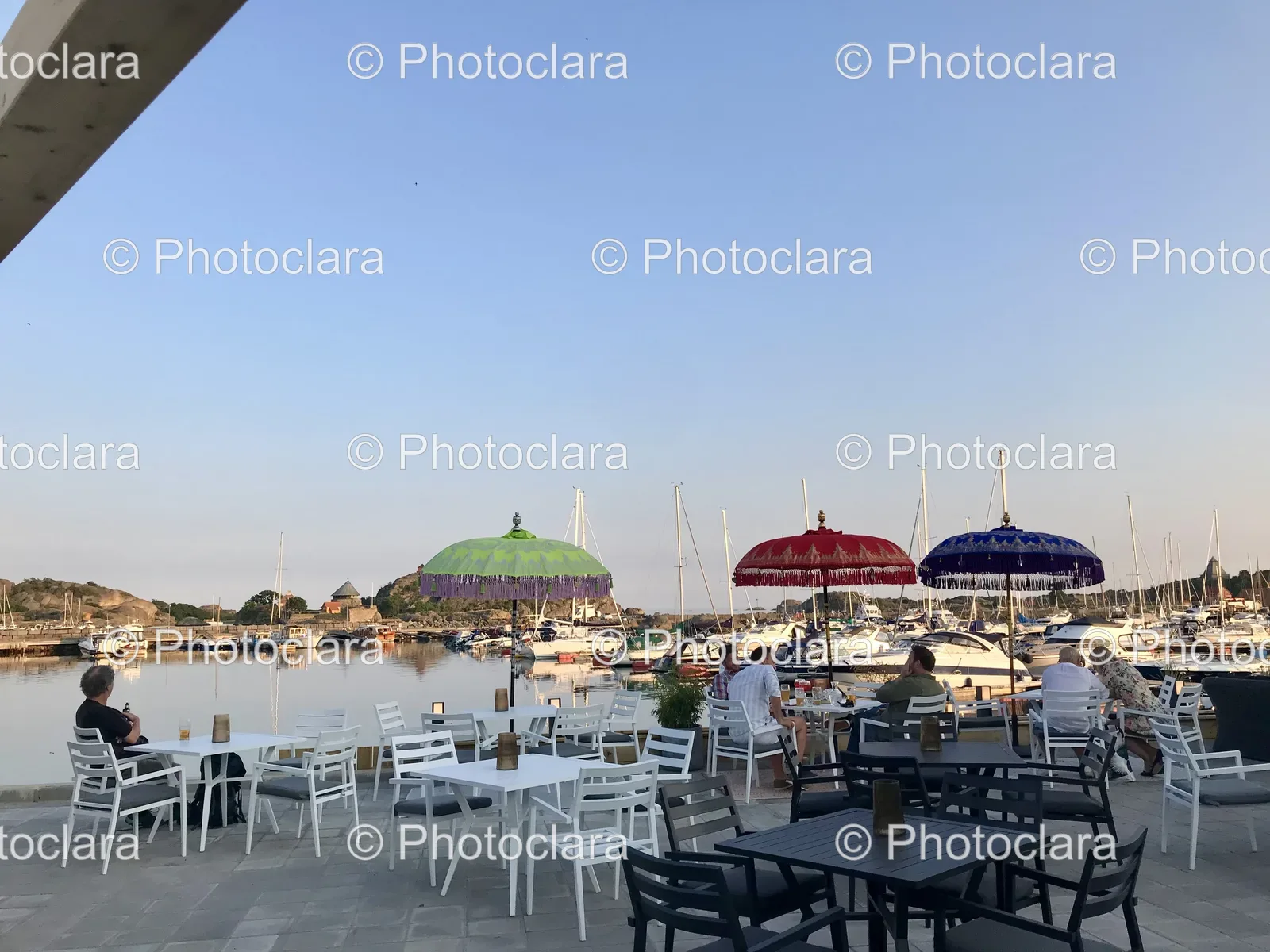 relaxing-under-umbrellas-at-beachside-restaurant.jpg