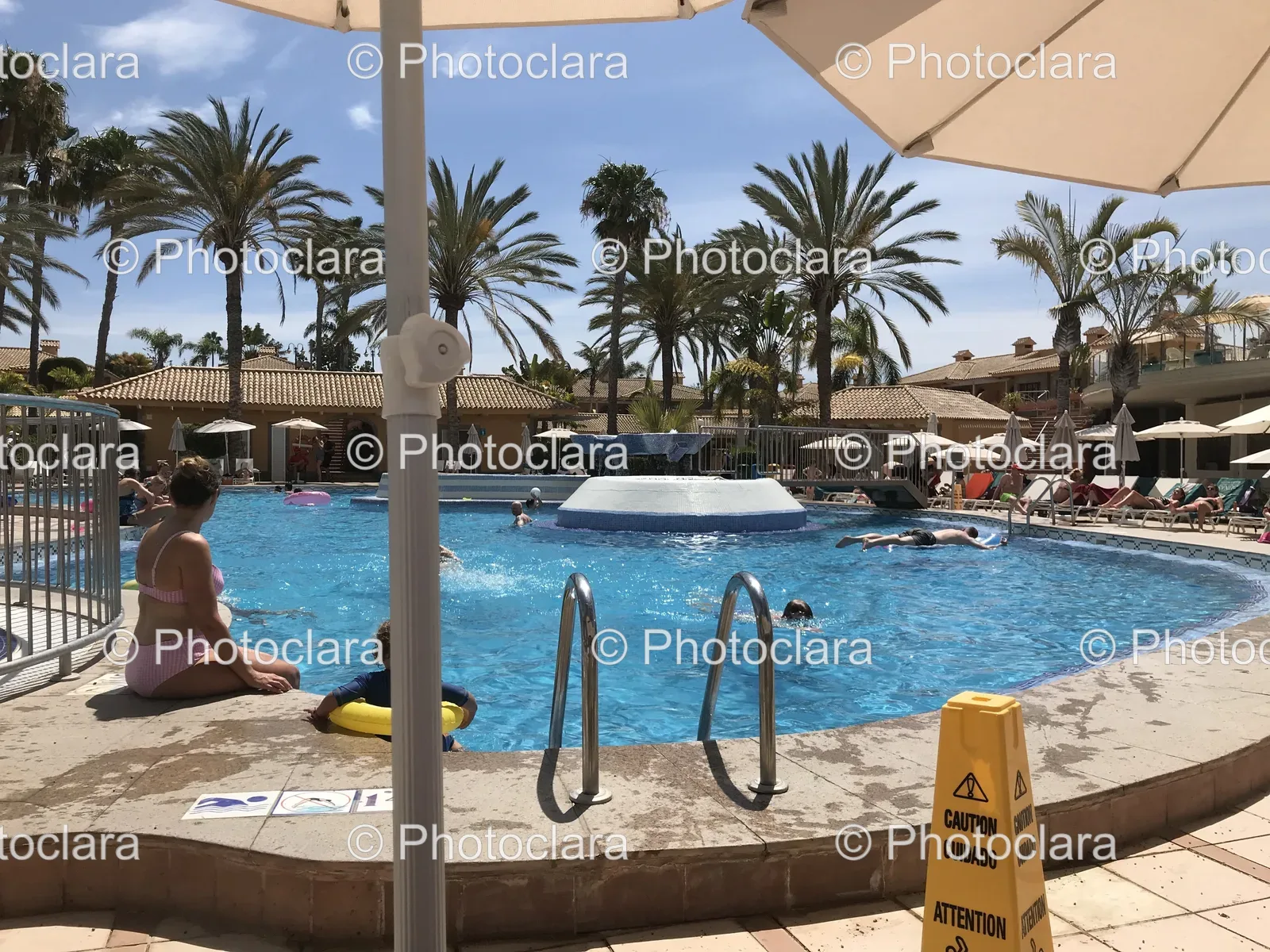 enjoying-a-leisure-day-by-the-pool.jpg