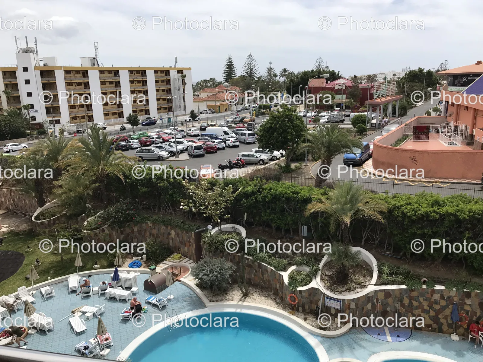 Outdoor-Pool-with-Parking-Lot-Background.jpg