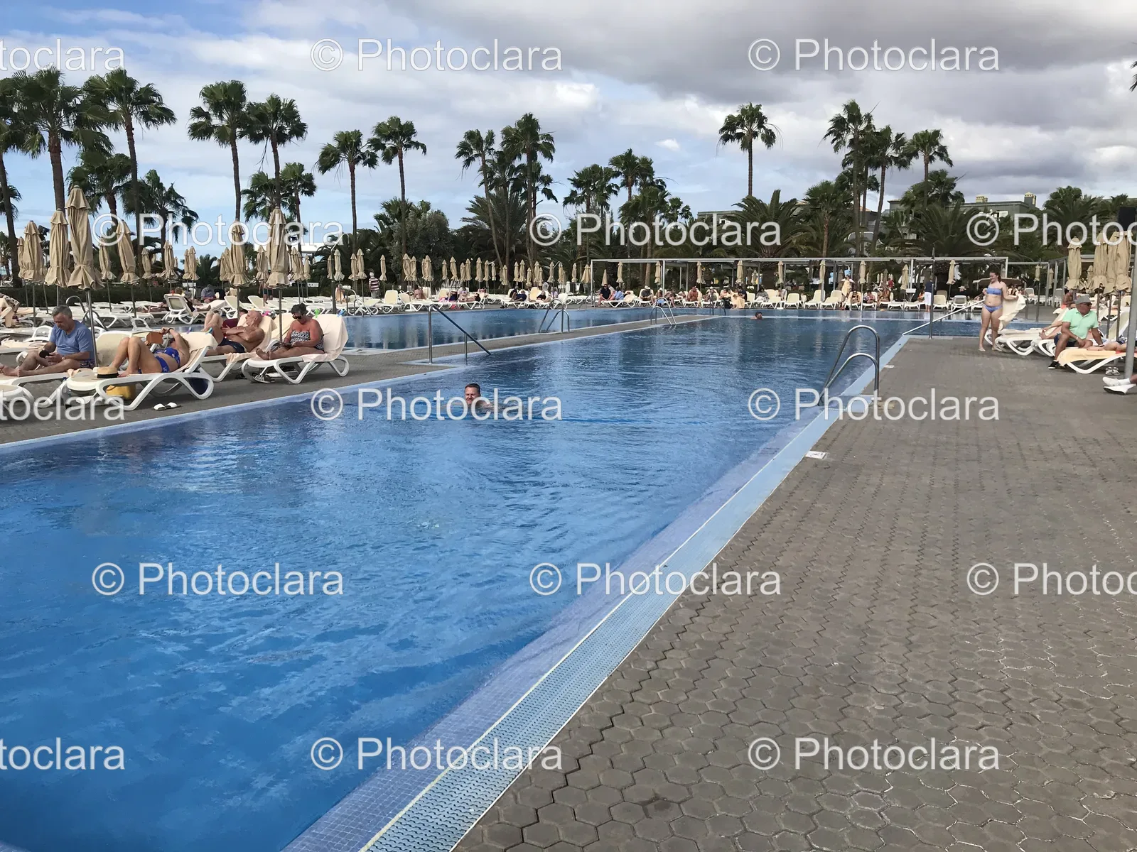 People-Enjoying-Swimming-Pool.jpg