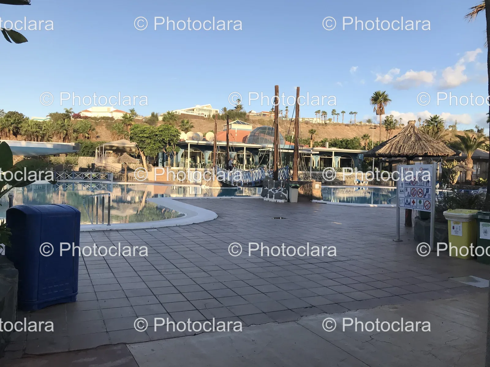 Serene-Poolside-View-with-Building-in-Background.jpg