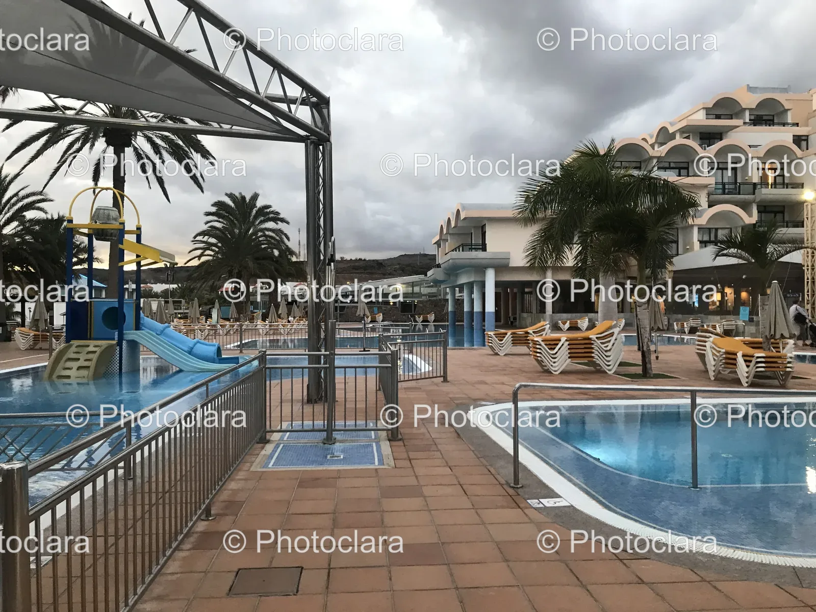 serene-resort-pool-slide-playground.jpg