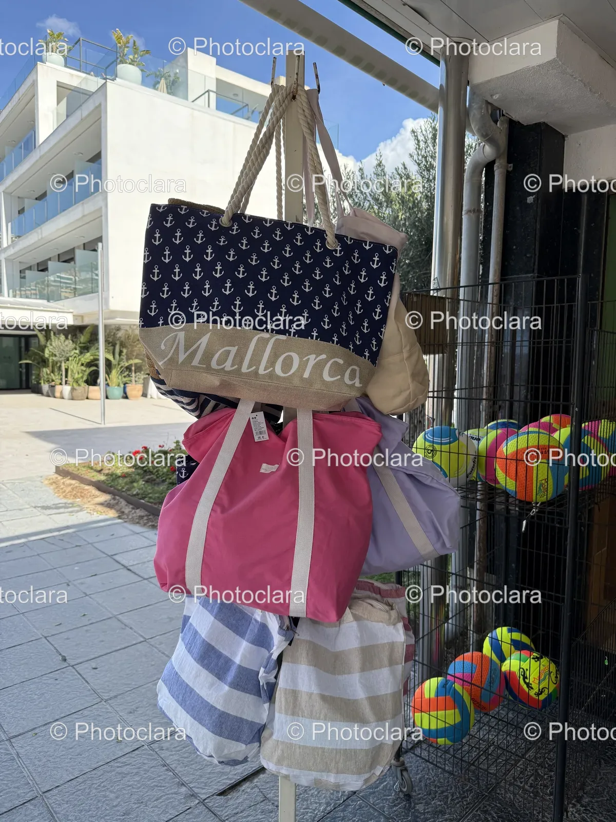 Colorful-Beach-Bags-Displayed-on-a-Rack.jpg