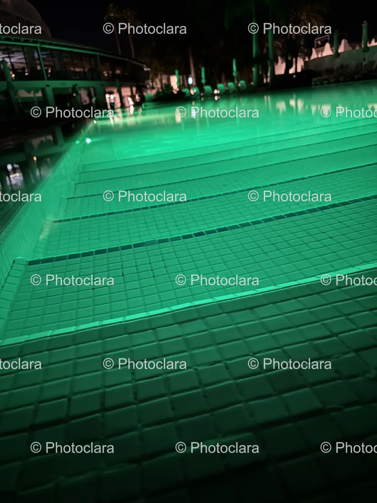 Glowing-Green-Pool-Amidst-the-Night.jpg
