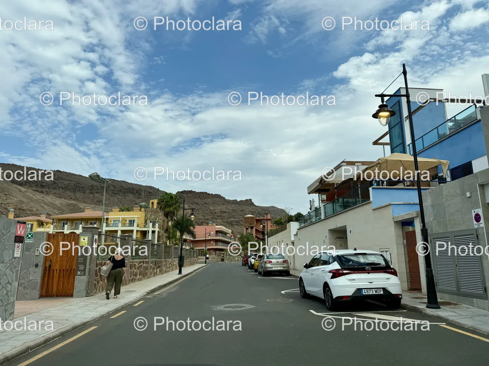 Bustling-Urban-Street-with-Cars-and-Buildings.jpg