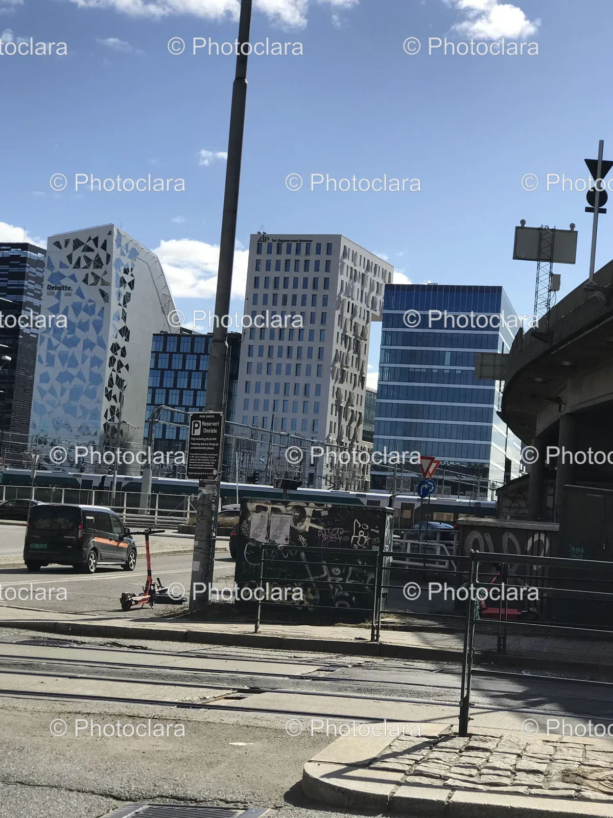 City-Street-with-Skyscrapers-and-Car.jpg