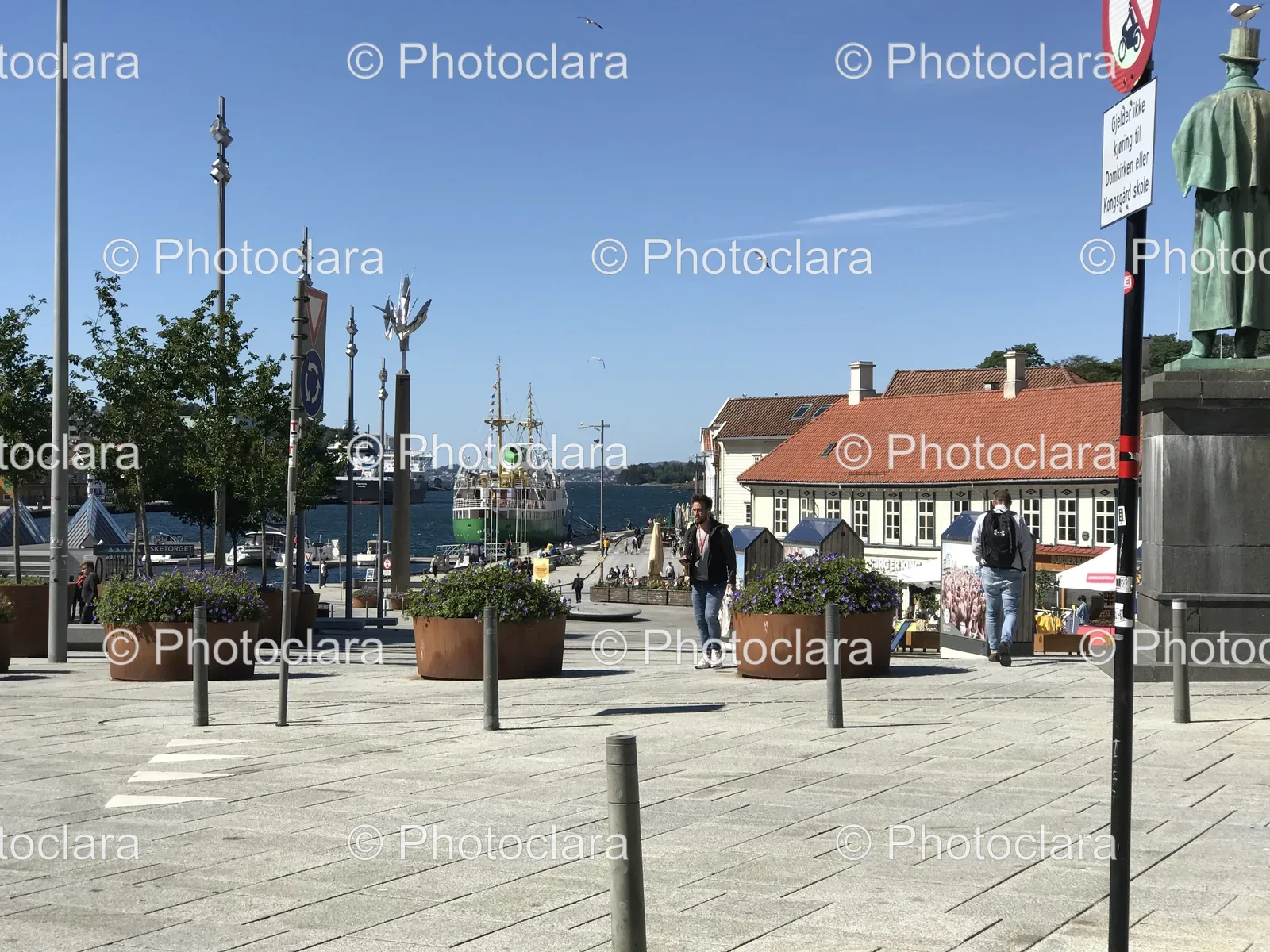 Person-Walking-Sidewalk-Boat-Background.jpg