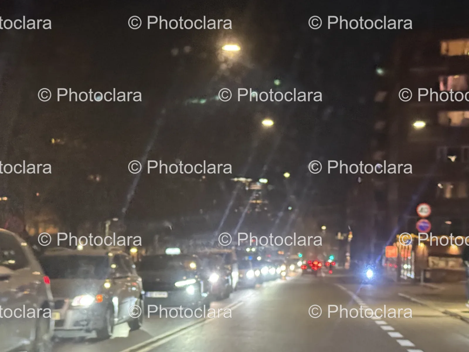 Bustling-Night-Street-with-Cars-and-Lights.jpg