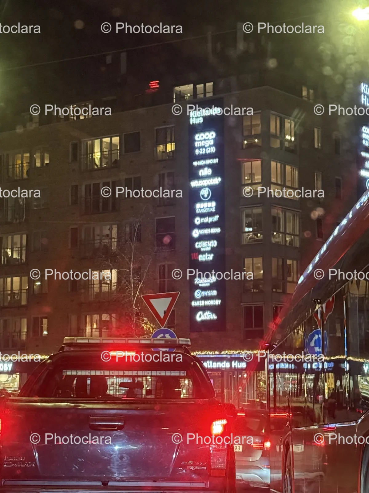 Car-and-City-Street-Illuminated-at-Night.jpg