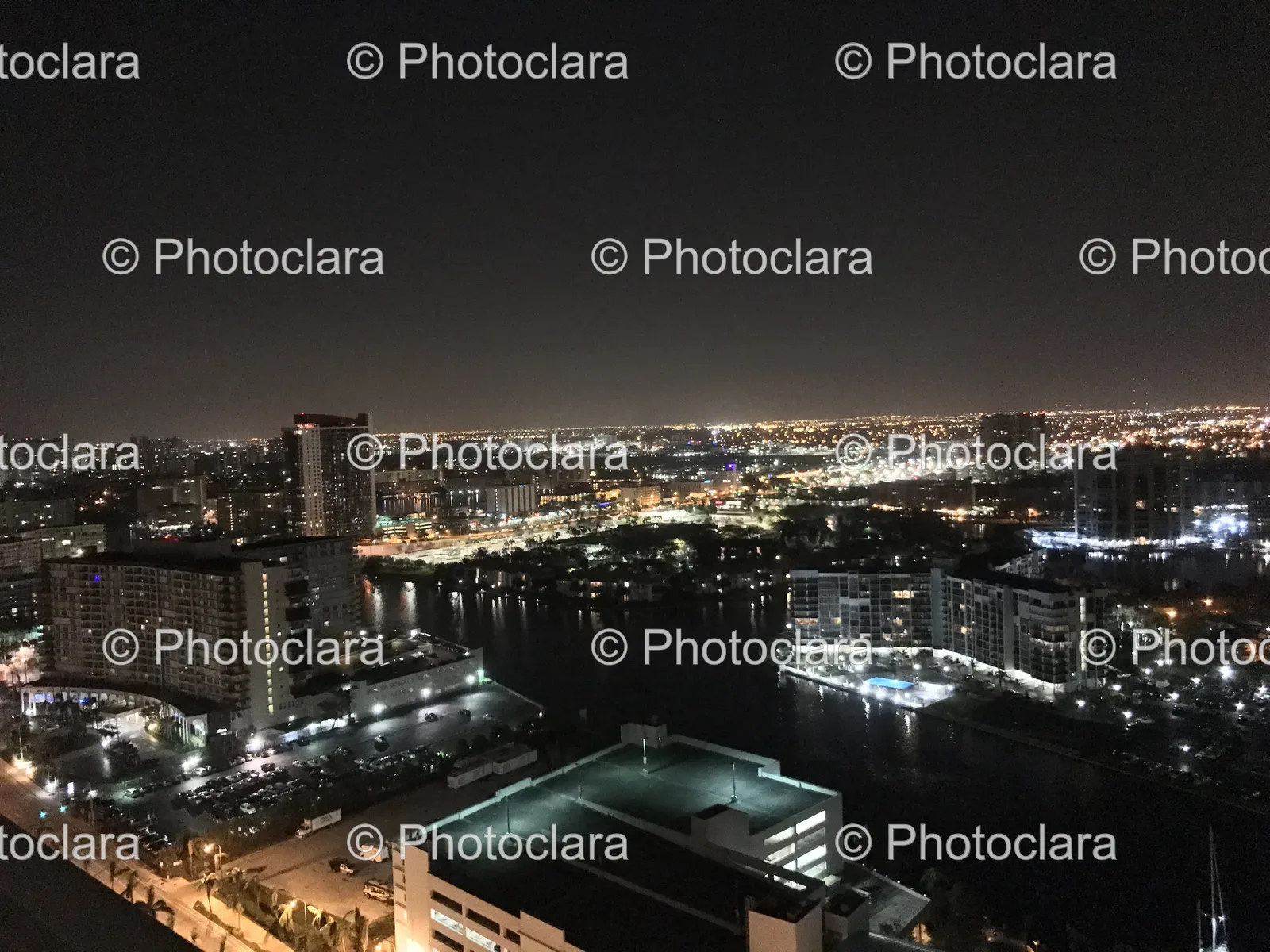 city-at-night-with-reflections-on-water.jpg