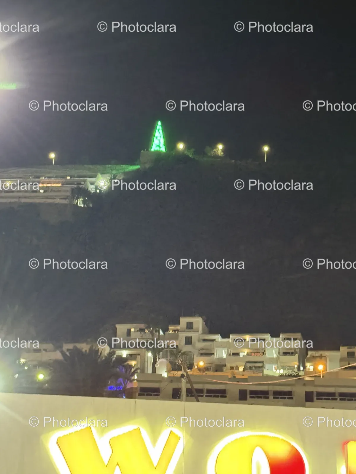 illuminated-city-building-on-hill.jpg