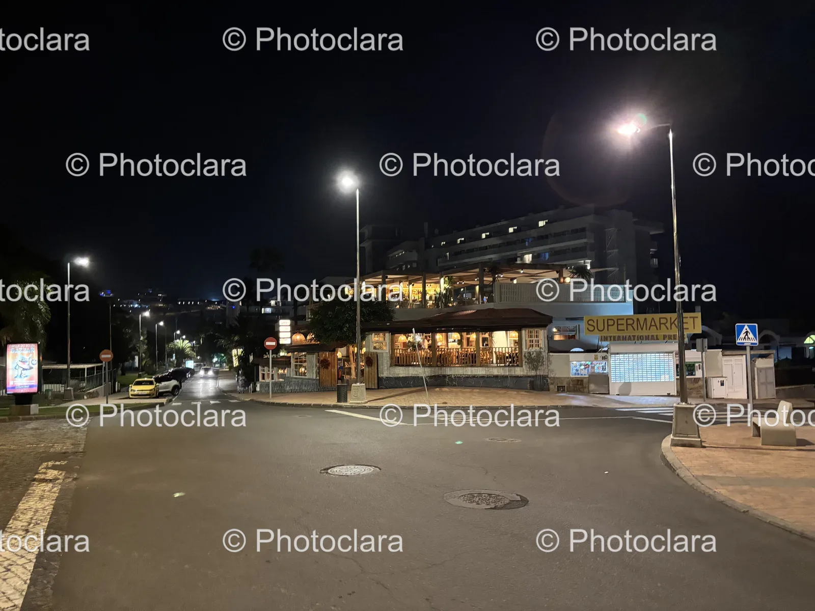 streetscape-of-nighttime-urban-supermarket.jpg